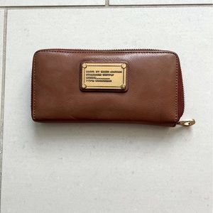 Rich brown leather zip around Marc Jacobs wallet